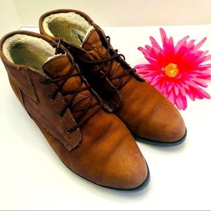 Eddie Bauer brown tie up ankle booties.